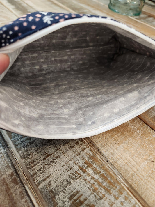 Navy blue zipper pouch with tiny trees