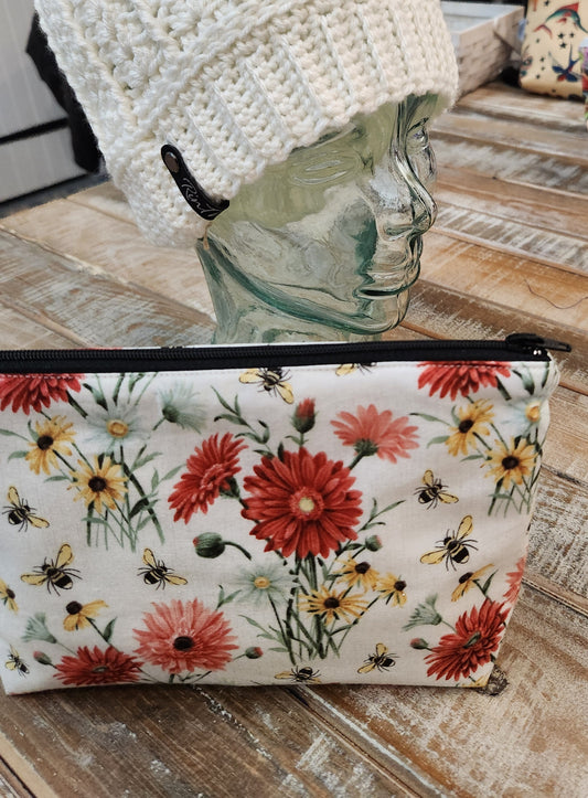 Red and yellow daisies with bees zipper pouch