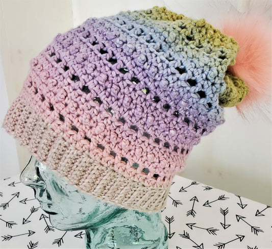 Pastel rainbow slouchy open stitch hat with pom pom