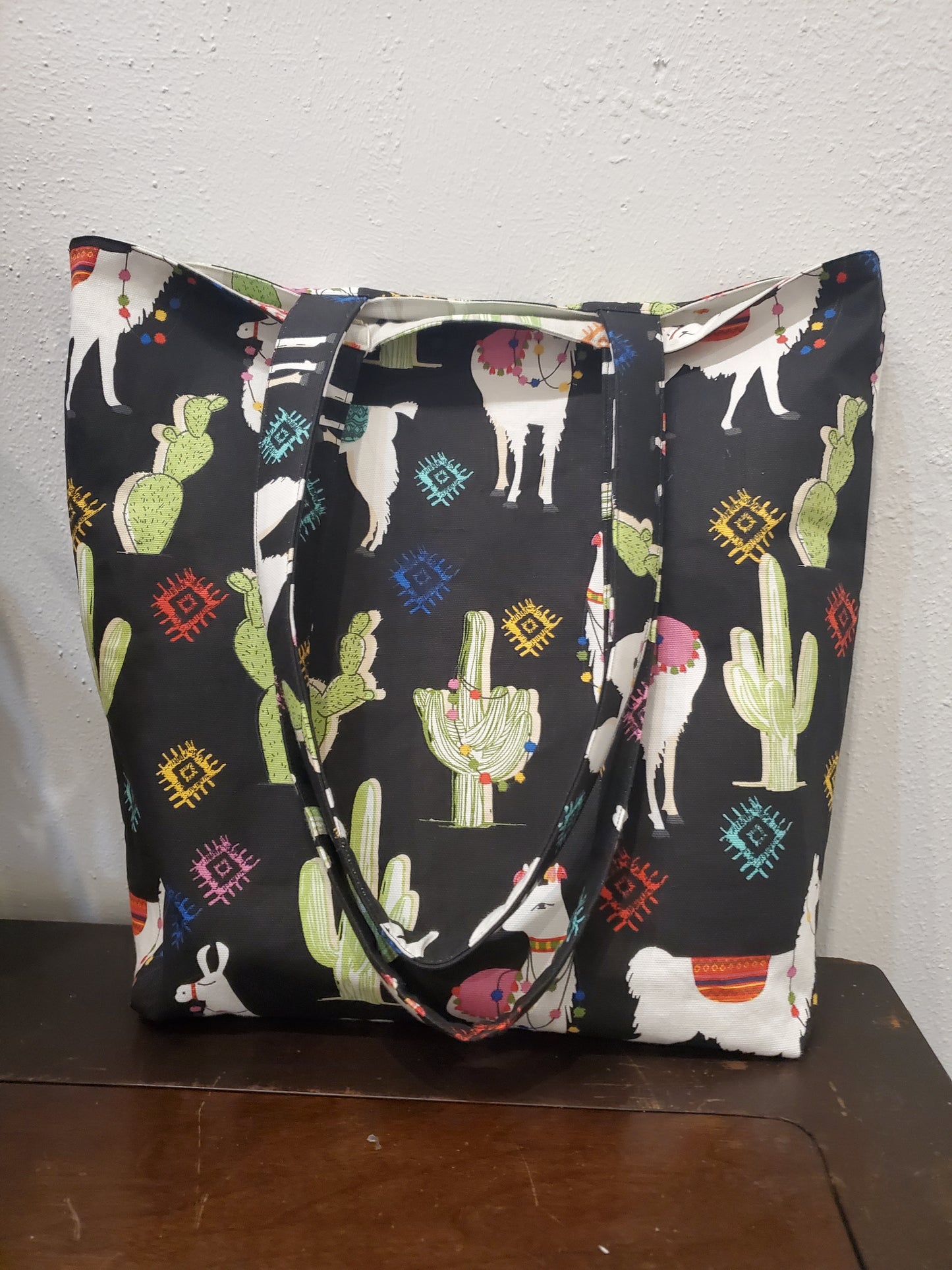 Llama print lined/reversible tote bag