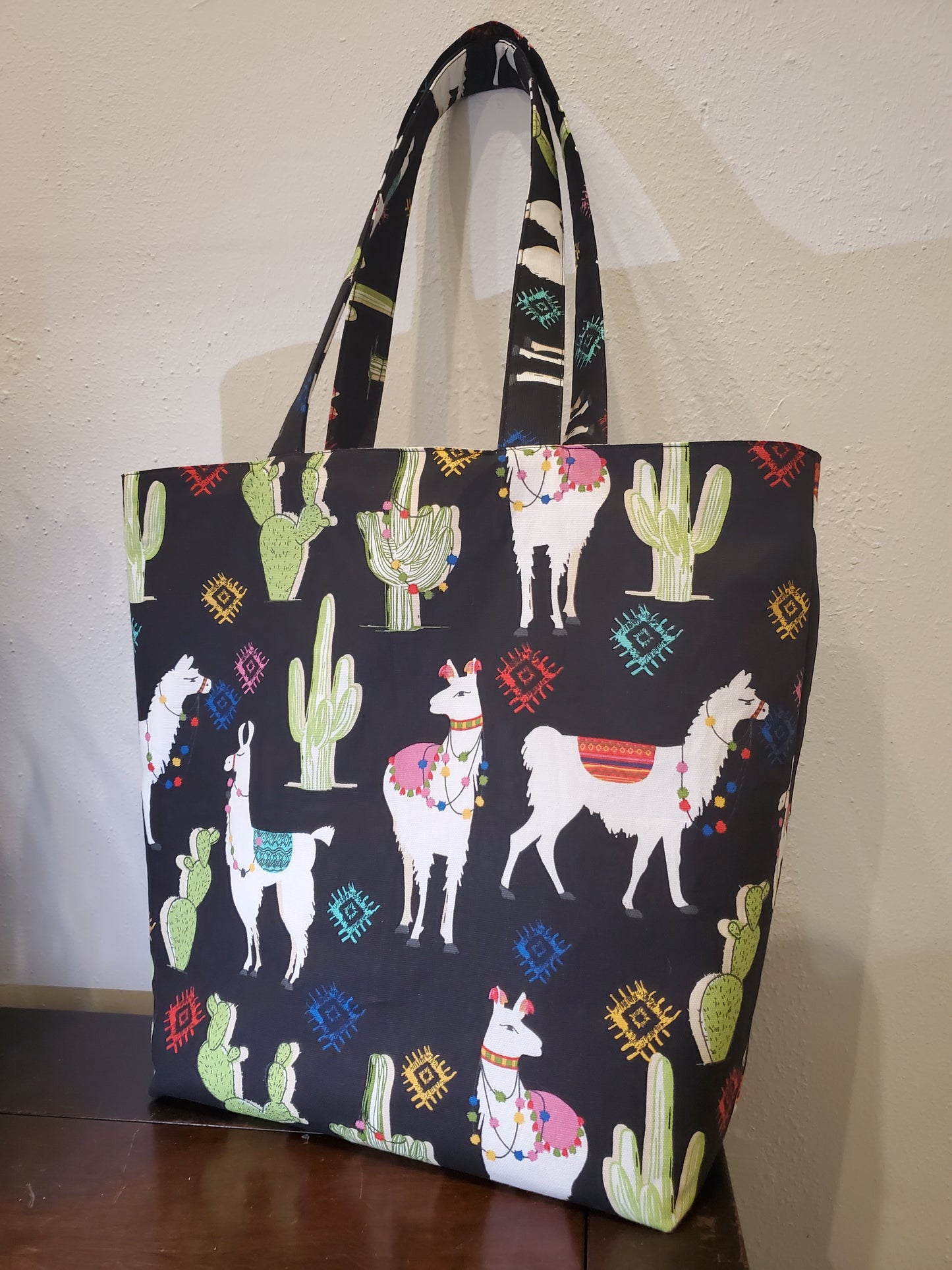 Llama print lined/reversible tote bag