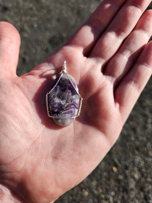 Silver wrapped amethyst stone pendant