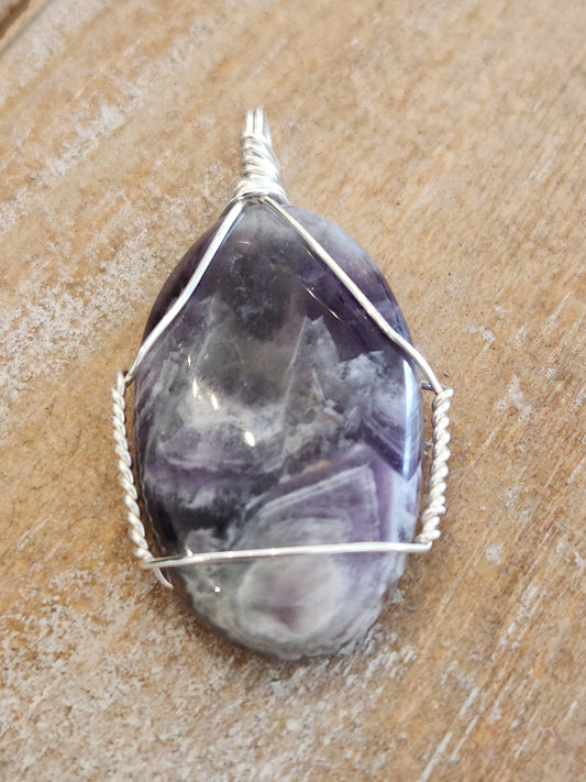Silver wrapped amethyst stone pendant