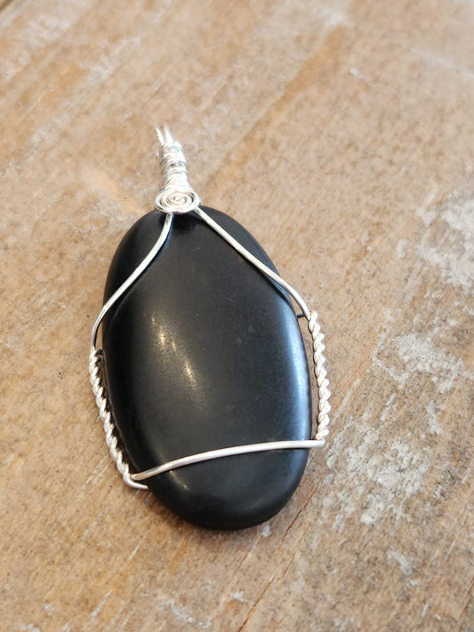 Silver wrapped matte black stone pendant