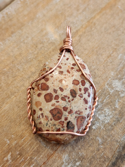 Copper wrapped poppy jasper pendant