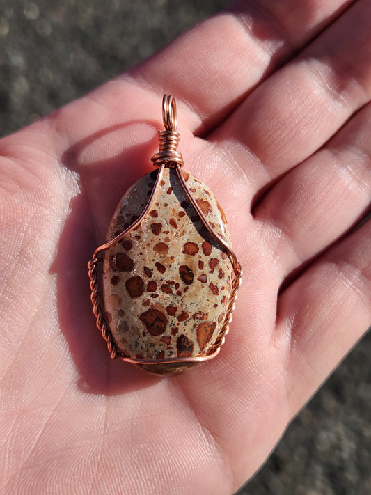 Copper wrapped poppy jasper pendant