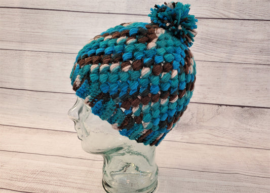 Blue and brown multicolor pom pom beanie