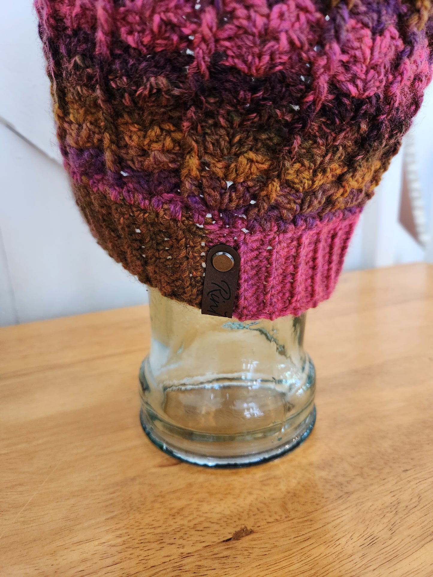 Bright fall colors with vivid pink hat