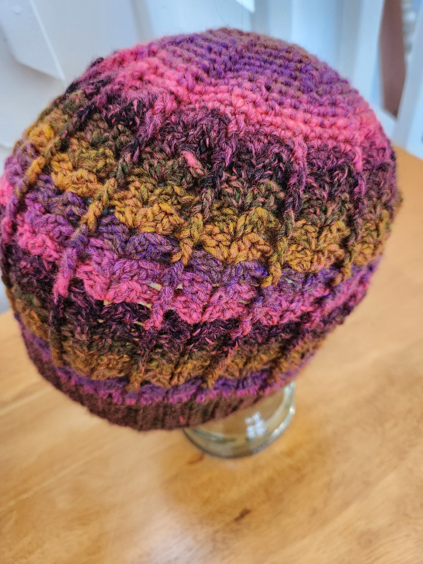 Bright fall colors with vivid pink hat