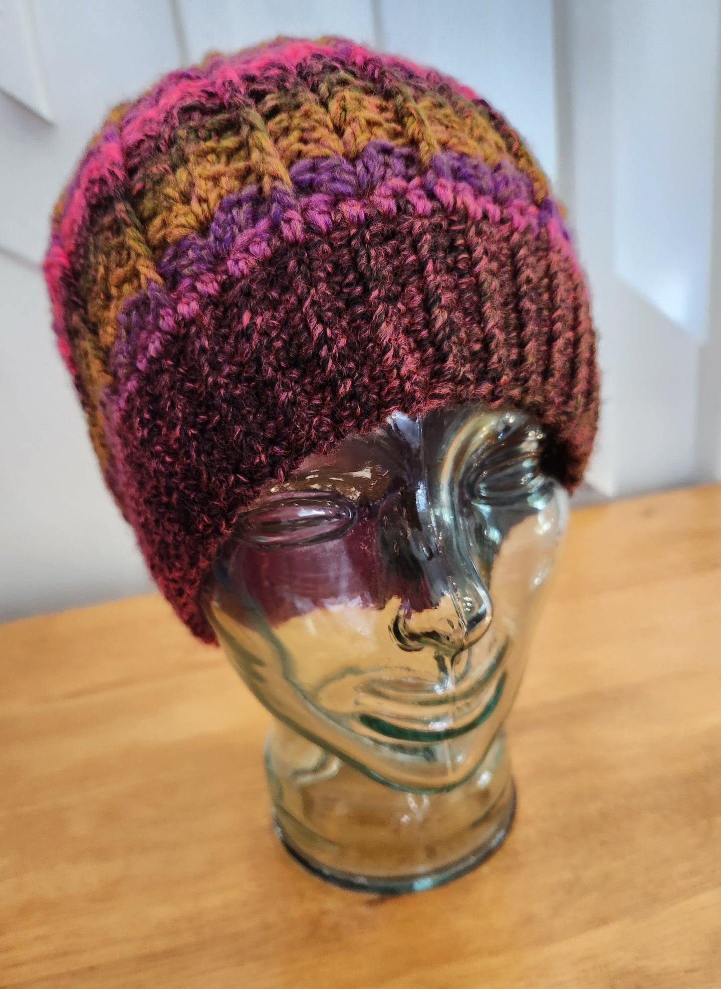 Bright fall colors with vivid pink hat