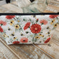 Red and yellow daisies with bees zipper pouch