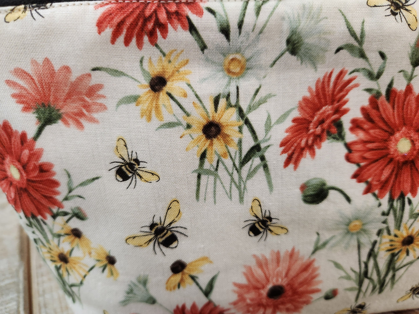 Red and yellow daisies with bees zipper pouch