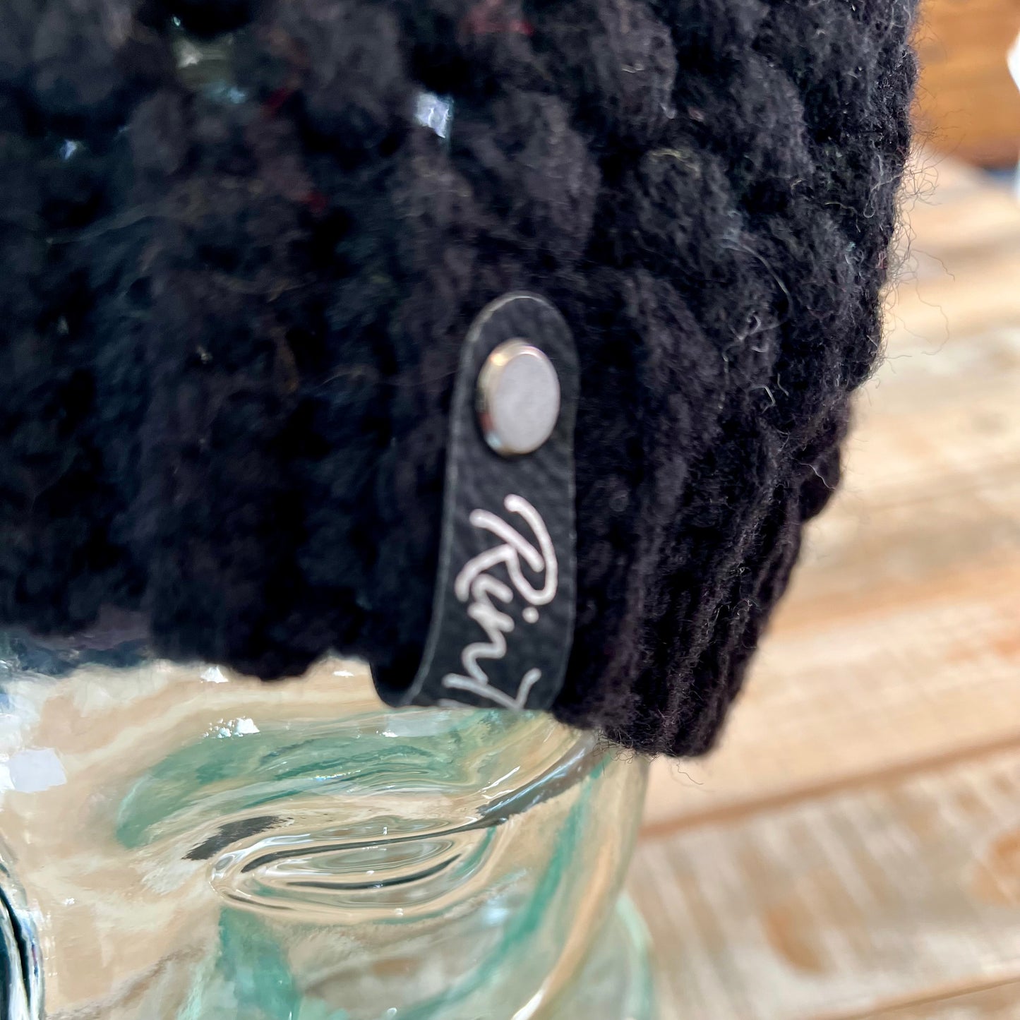 Black pom pom beanie