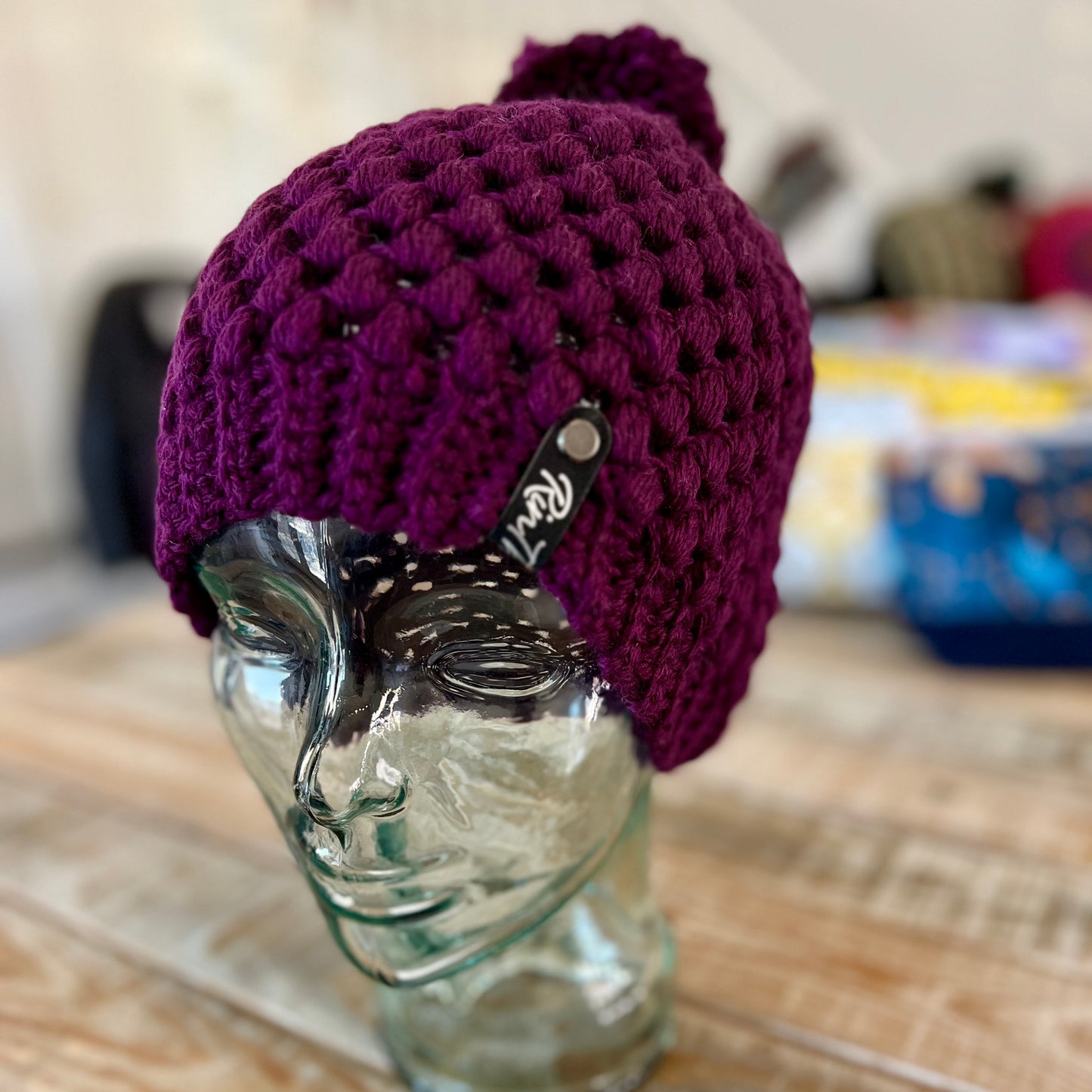 Eggplant purple pom pom beanie