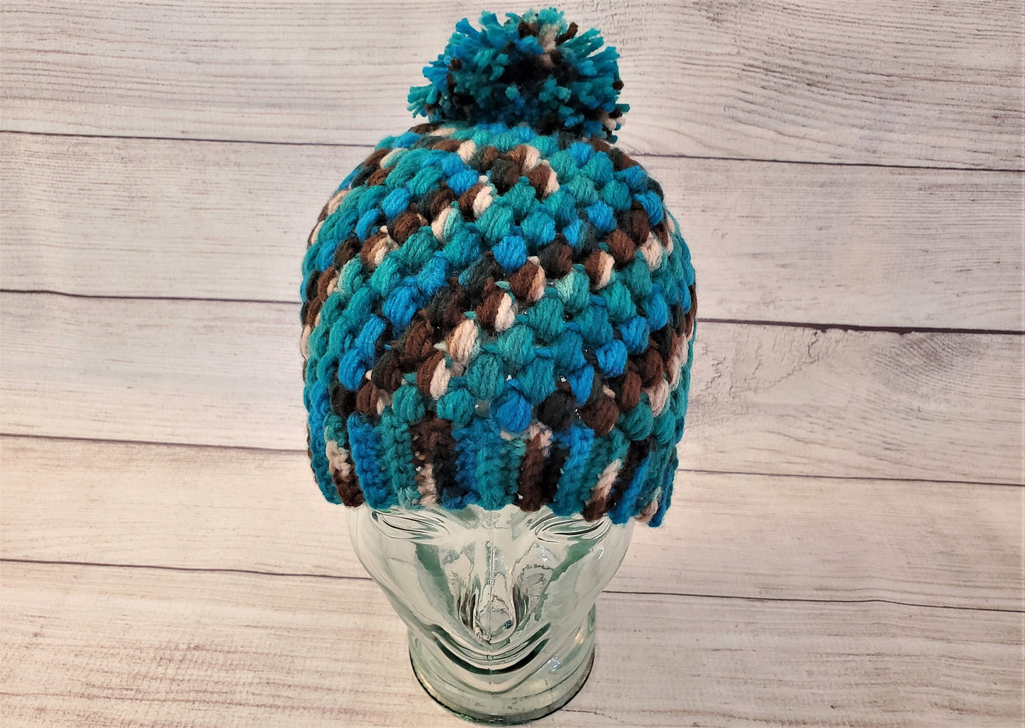 Blue and brown multicolor pom pom beanie