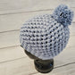 Powder blue pom pom beanie