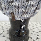 Grey and white cap with brim and toggle